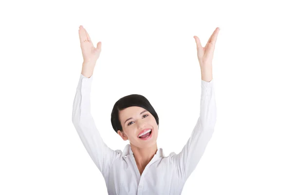 Young happy businesswoman with hands up — Stock Photo, Image