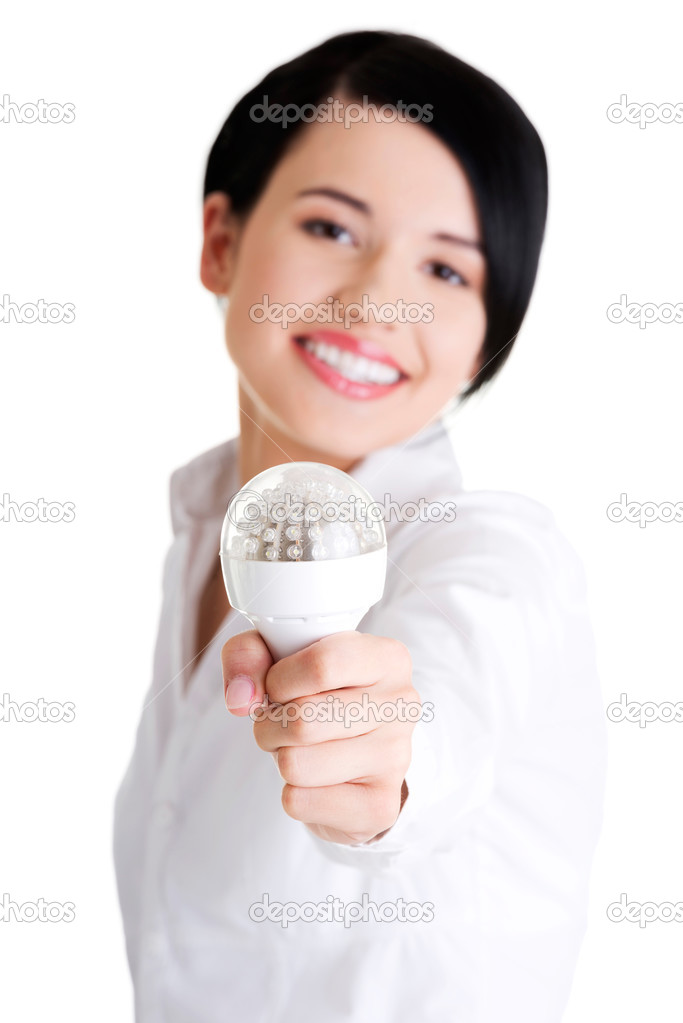 Businesswoman showing led bulb