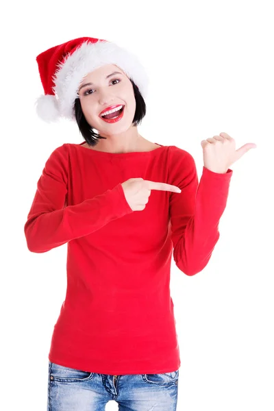 Santa woman pointing on side — Stock Photo, Image