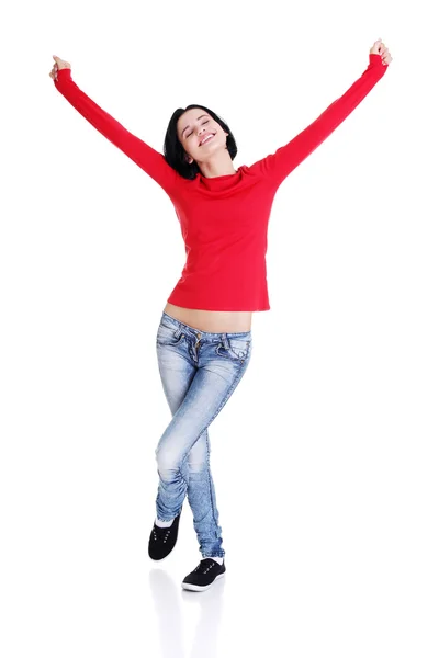 Excited young woman with fists up — Stock Photo, Image