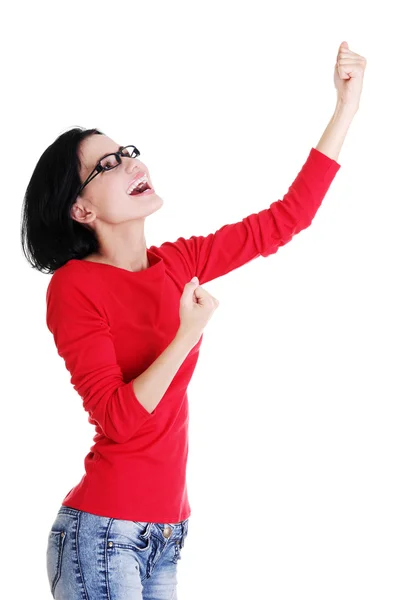Aufgeregte junge Frau mit erhobenen Fäusten — Stockfoto
