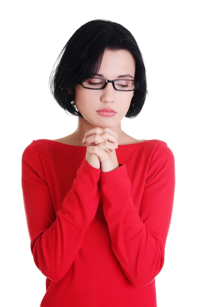 Portrait of a young caucasian woman praying — Stock Photo, Image