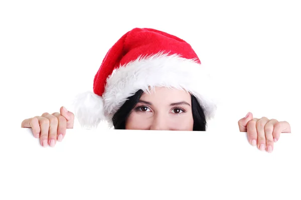 Santa girl holding blank board — Stock Photo, Image