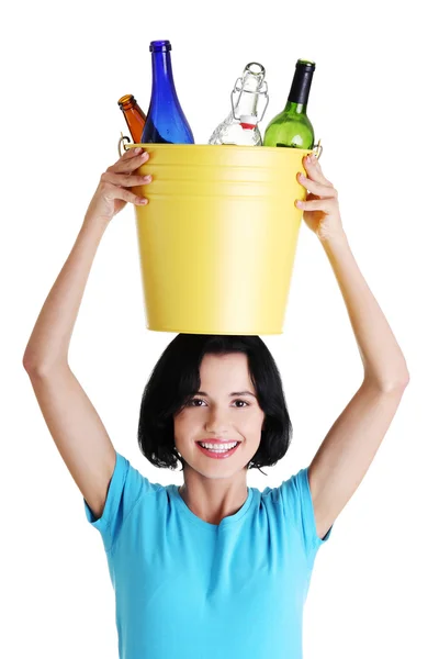 Beautiful young woman holding recycling bin — Stock Photo, Image