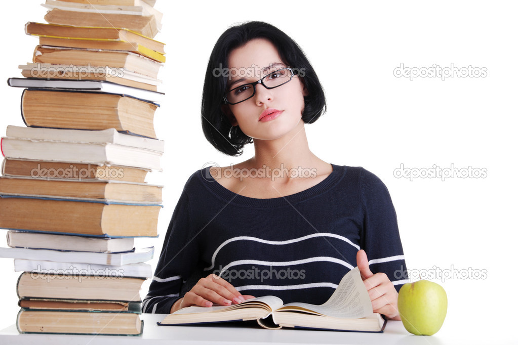 Young student woman studying at the desk