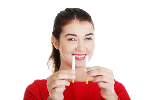 Vrouw met sigaret en elektronische sigaret — Stockfoto