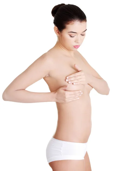 Woman examining breast mastopathy or cancer. — Stock Photo, Image