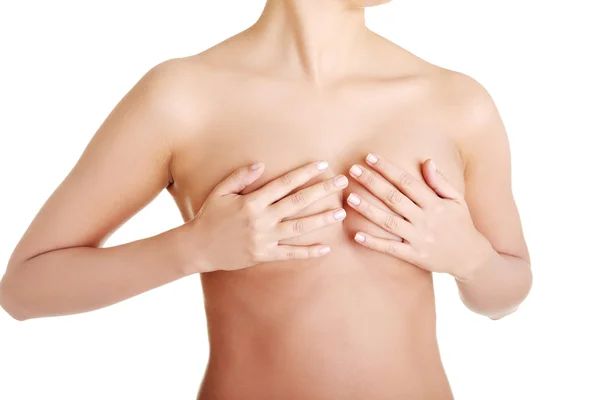 Woman holding her breast — Stock Photo, Image