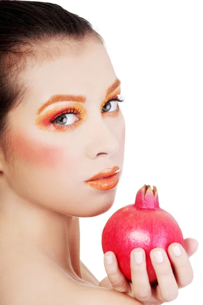 Portrait of young beautiful woman with pomegranate — Stock Photo, Image