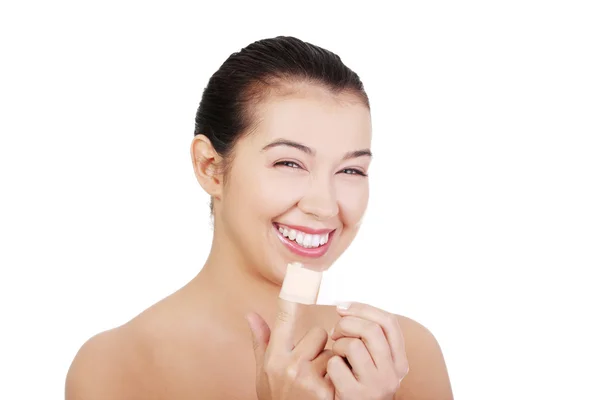 Pretty young woman using adhesive plaster. — Stock Photo, Image