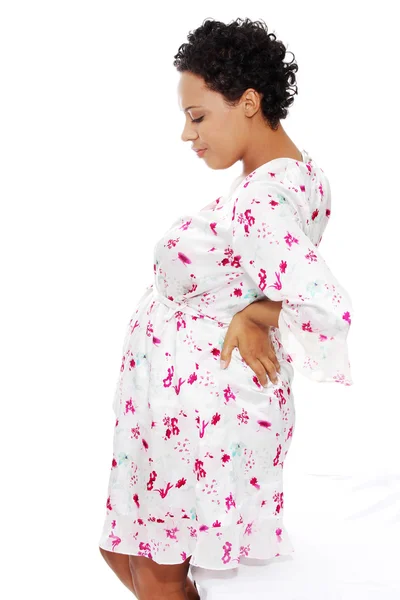 Femme enceinte soulèvement des maux de dos — Photo