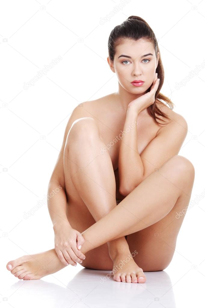 Sexy fit naked woman with healthy clean skin