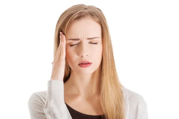 Beautiful woman's portrait, having headache. — Stock Photo, Image