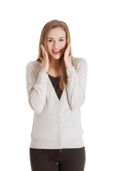 Beautiful positive and casual woman expressing surprise. — Stock Photo, Image