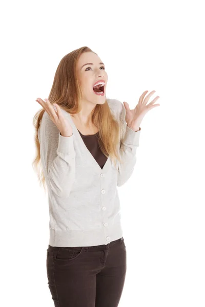 Beautiful positive and casual woman expressing surprise. — Stock Photo, Image