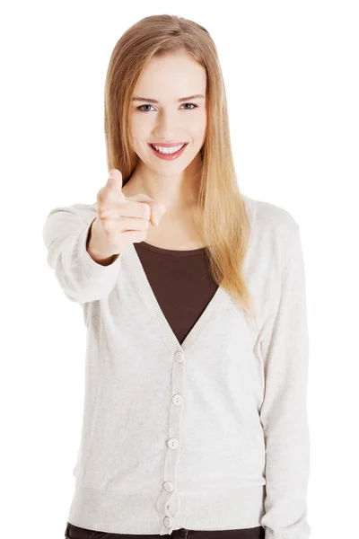 Beautiful casual woman pointing on you. — Stock Photo, Image