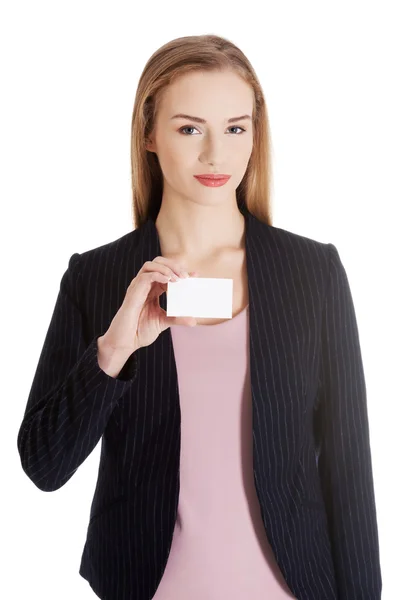 Beautiful business woman holding small personal card. — Stock Photo, Image