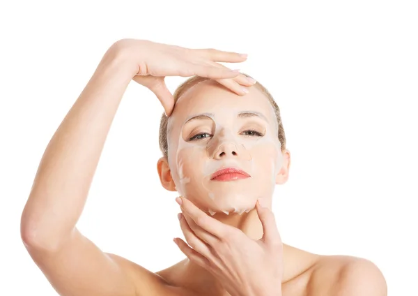 Beautiful woman with collagen mask on face. — Stock Photo, Image