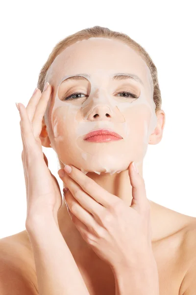 Beautiful woman with collagen mask on face. — Stock Photo, Image