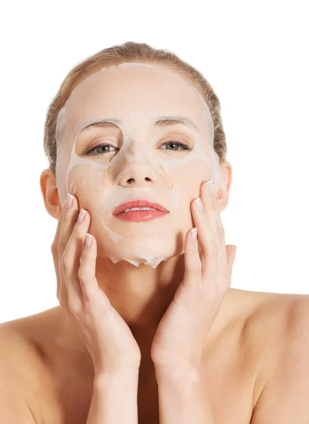 Beautiful woman with collagen mask on face. — Stock Photo, Image