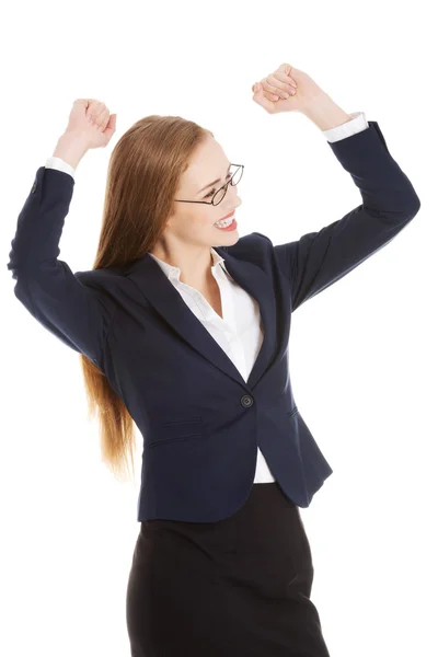 Beautiful business woman with her hands up. She's satisfied. — Stock Photo, Image