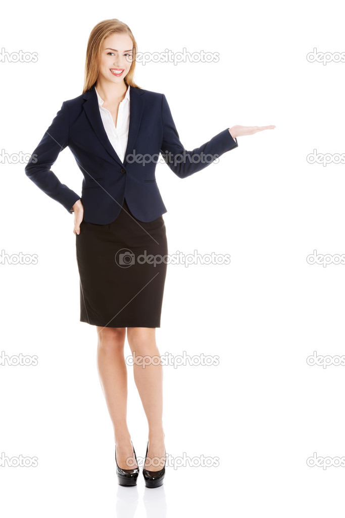 Beautiful business woman showing copy space on palms.