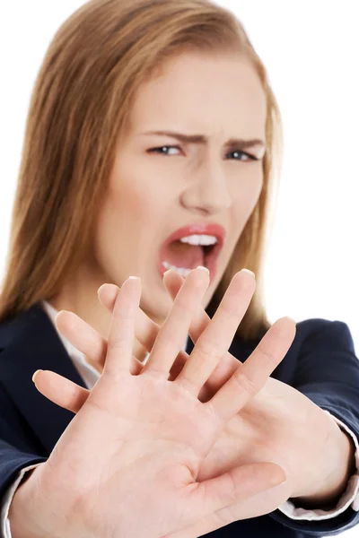 Beautiful caucasian business woman shows rejection and screams. — Stock Photo, Image