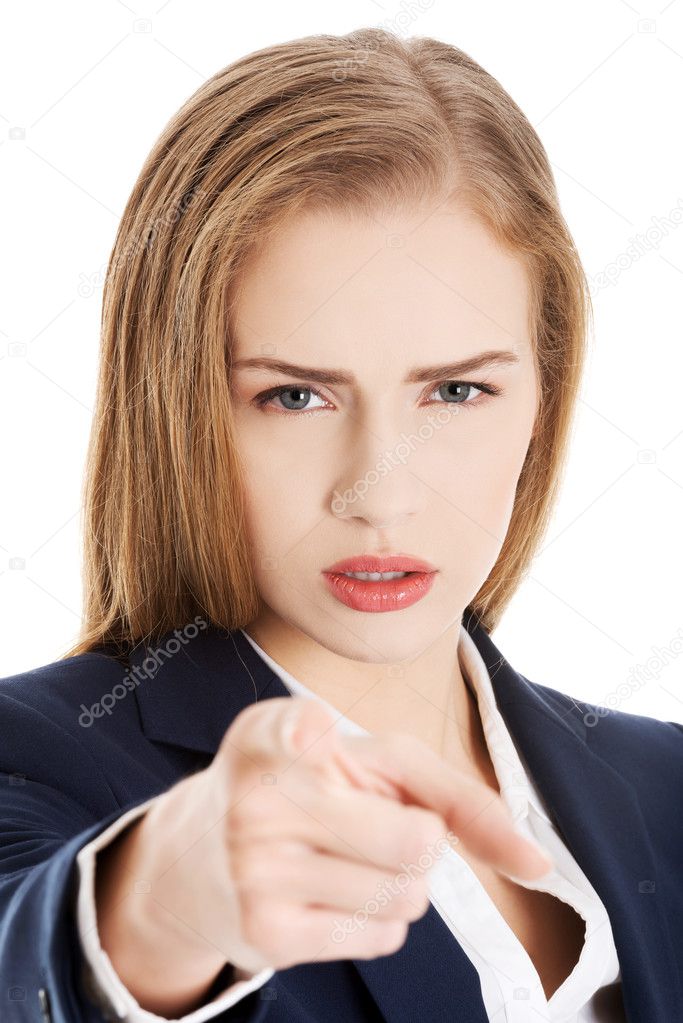 Young caucasian business woman showing warning gesture by hand.