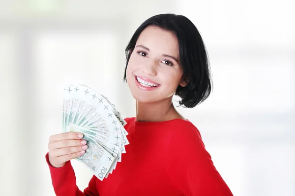 Fröhliche junge Dame mit Bargeld — Stockfoto