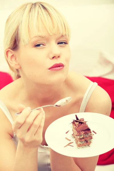 Eating chocolate cake — Stock Photo, Image