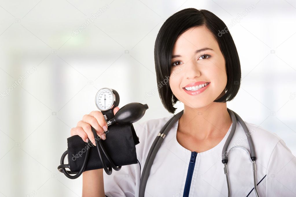 Woman doctor with pressure gauge