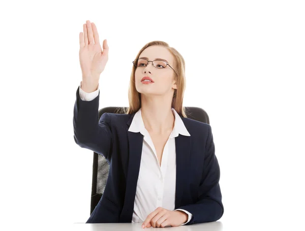 Business woman is sitting and showing stop gesture. — Stock Photo, Image
