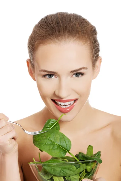 Woman eating lettuce — Stock Photo, Image