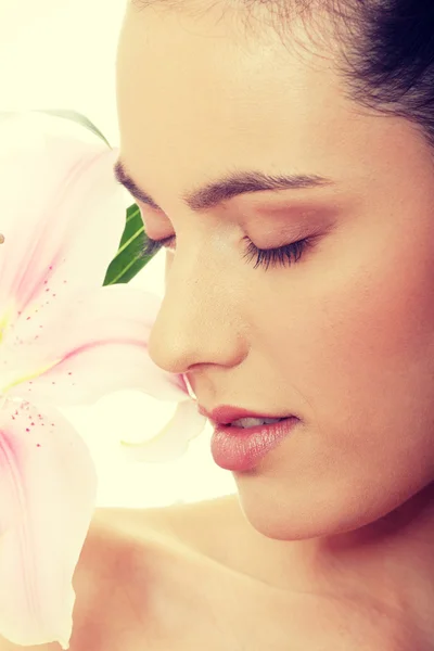 Woman with lilly flower — Stock Photo, Image