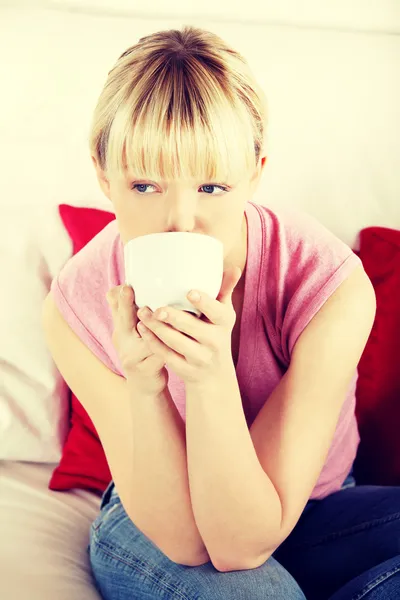 Young beautiful woman drinking — Stock Photo, Image