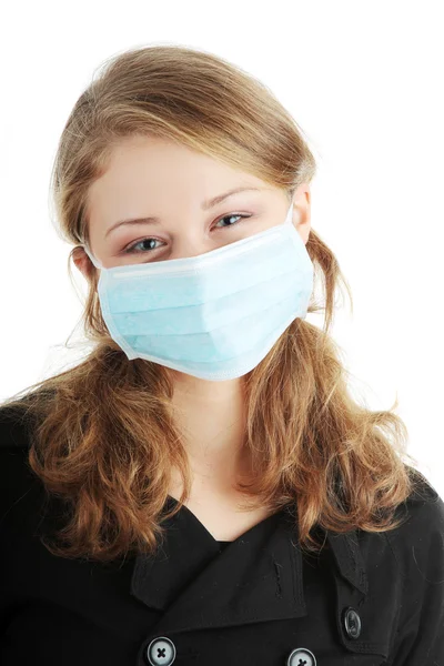 En modell som bär en mask för att förhindra "svininfluensan" infektion. — Stockfoto