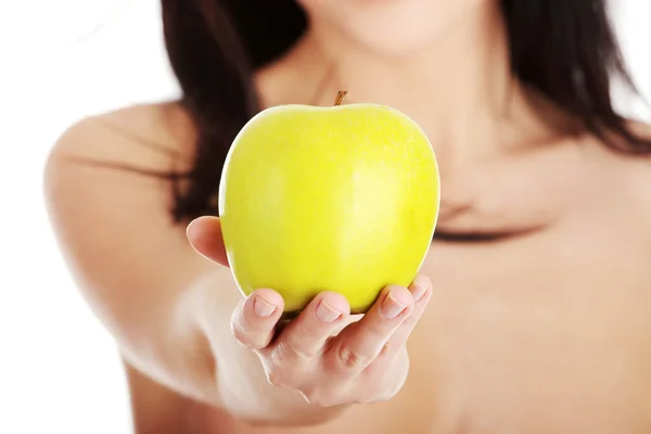 Girl with a green juicy apple — Stock Photo, Image