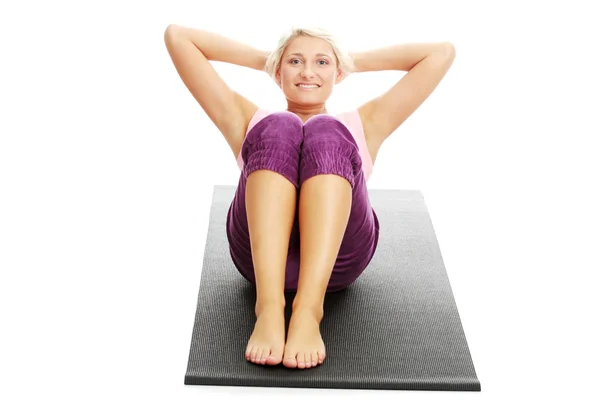 Young beautiful woman during fitness time — Stok fotoğraf