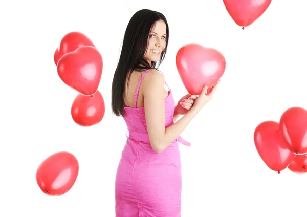 Kırmızı kalp balon ile güzel bir genç kadın — Stok fotoğraf