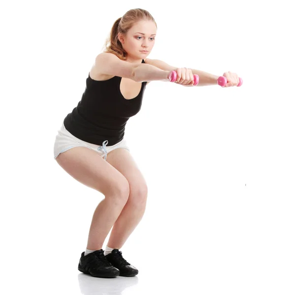 Beautiful young blonde exercising — Stock Photo, Image