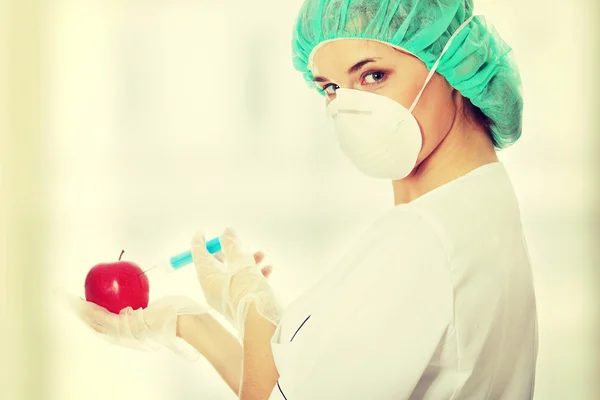 Woman and an apple — Stock Photo, Image