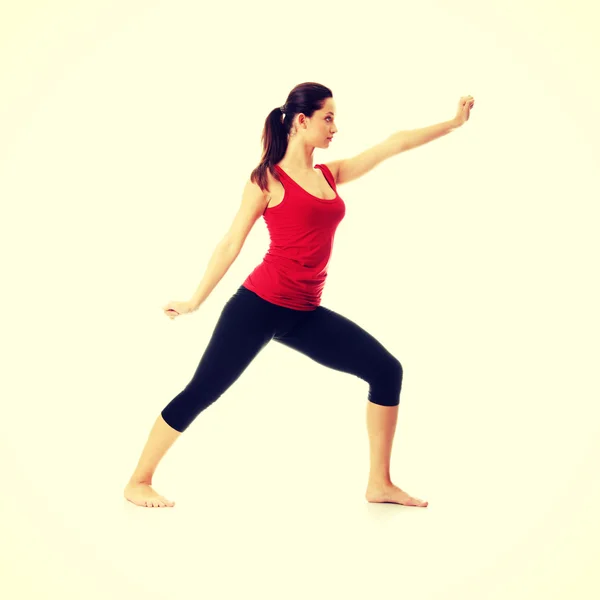 Mujer joven haciendo ejercicio de yoga —  Fotos de Stock