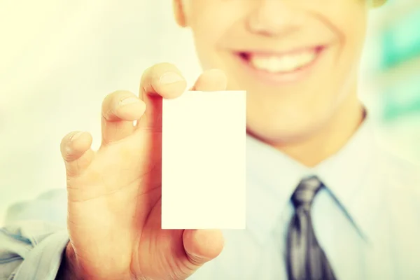 Business man with blank business card — Stock Photo, Image