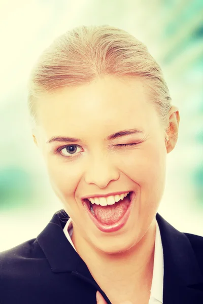 Businesswoman blinking — Stock Photo, Image