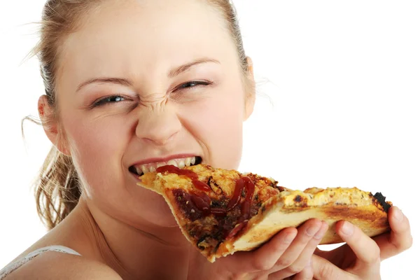 Gelukkig jongedame eten van pizza — Stockfoto