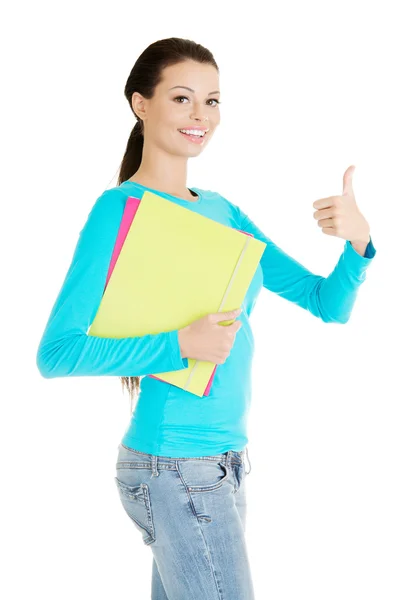 Woman with book gesturing OK — Stock Photo, Image