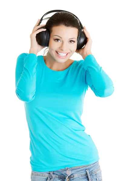 Mulher com fones de ouvido — Fotografia de Stock