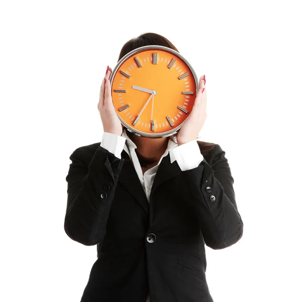 Mujer de negocios con reloj Imagen de stock