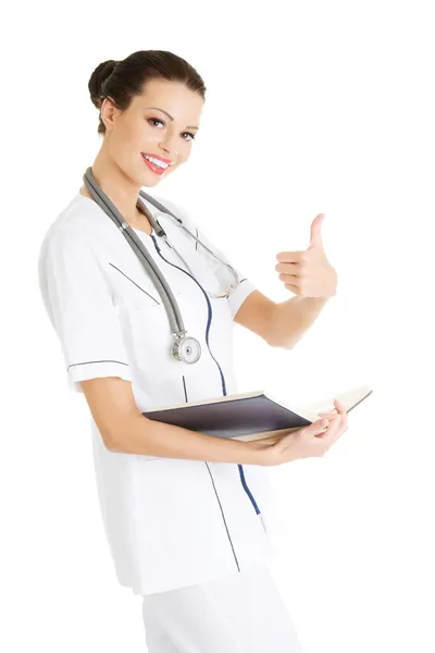 Studente di medicina attraente o medico con libro — Foto Stock