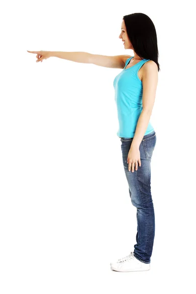 Mulher apontando no espaço de cópia — Fotografia de Stock